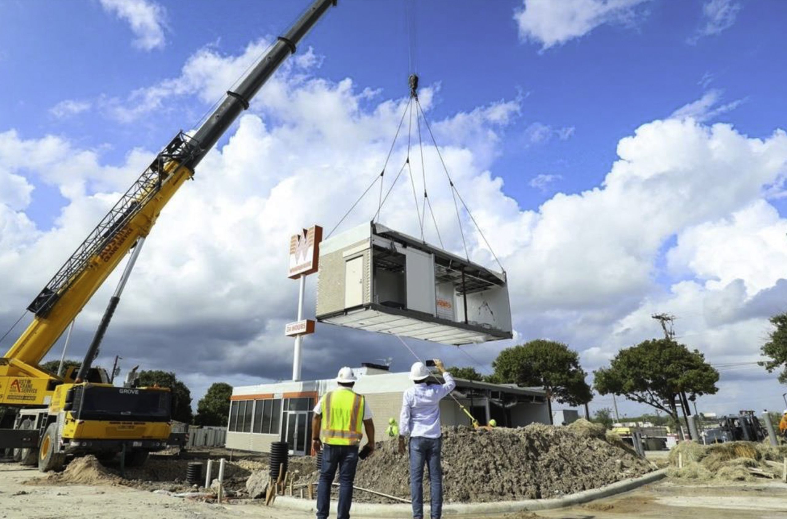 night reflections on city canal waterway in The Woodlands Texas