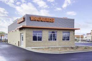 night reflections on city canal waterway in The Woodlands Texas