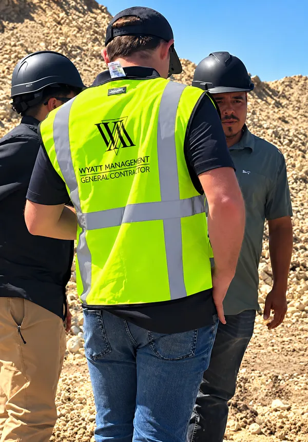 Construction Team Discussion on Site (1)